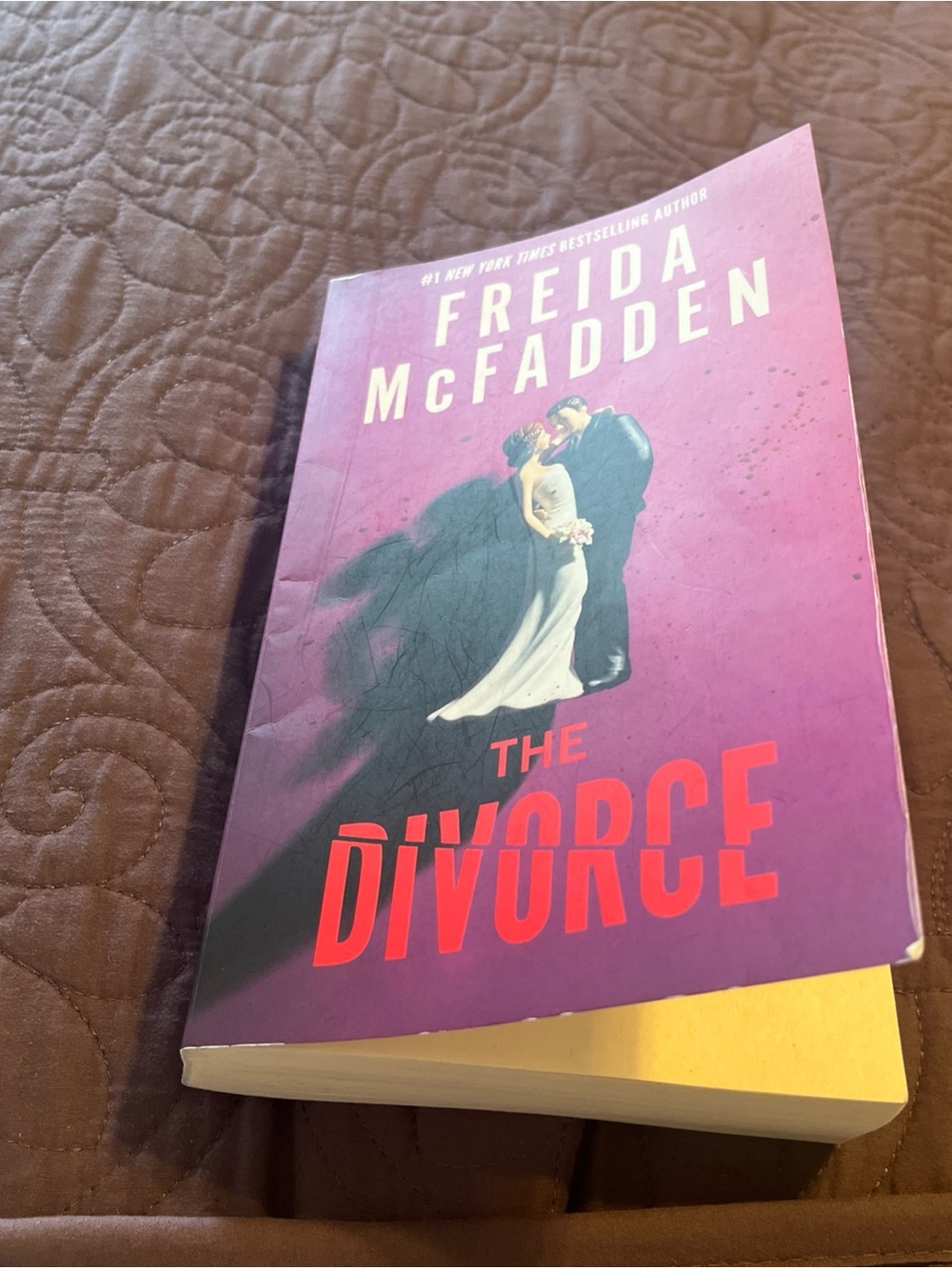 Source Unknown Purple and Red "The Divorce" by Freida McFadden